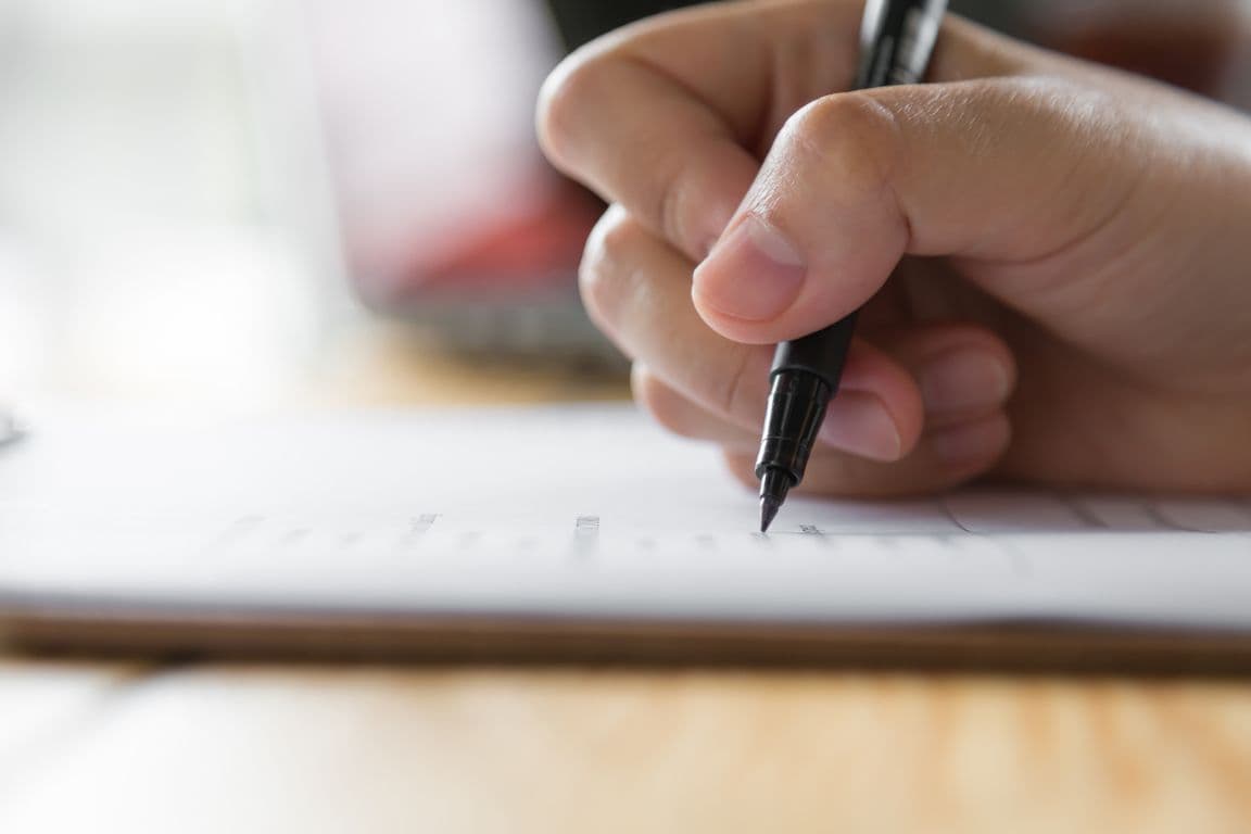 hand-writing-paper-with-pen_20.jpg